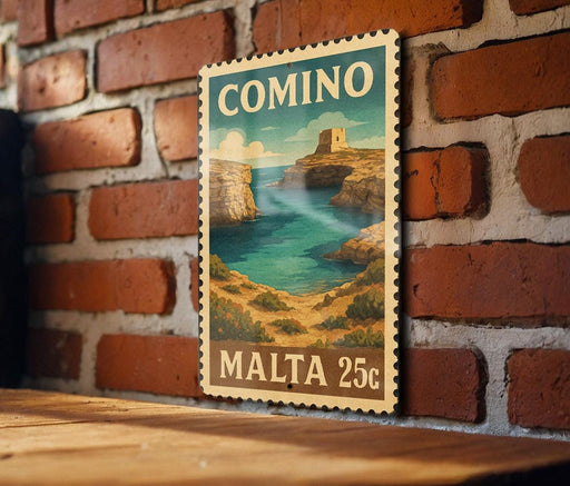 A vintage-style postage stamp depicting a scenic coastal landscape with cliffs and a castle, mounted on a brick wall.