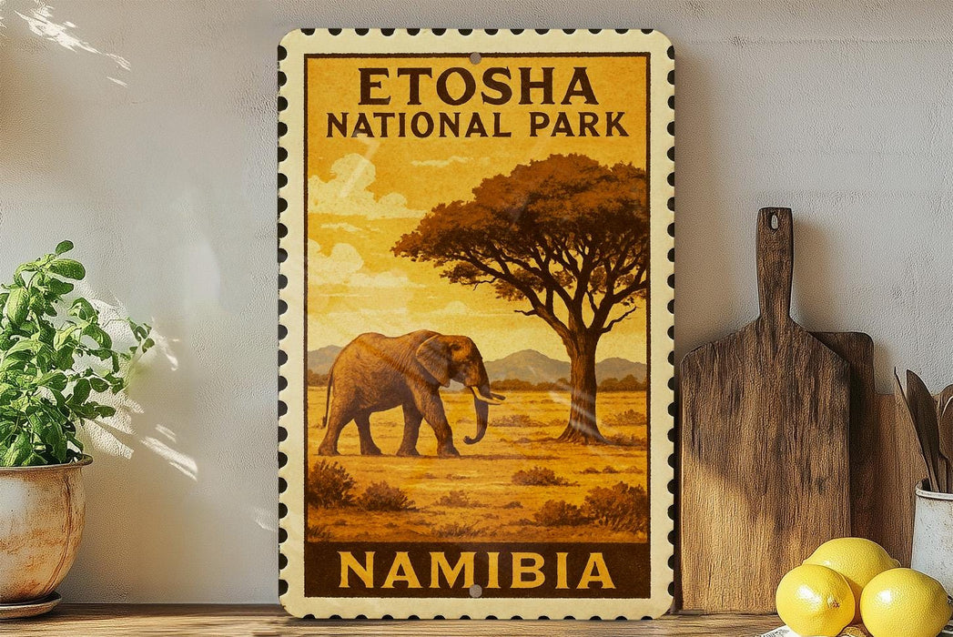a decorative stamp or sign with an illustration of an elephant in a savanna landscape, surrounded by trees and mountains, with the text "ETOSHA NATIONAL PARK NAMibia" prominently displayed.
