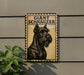 a large black and white dog, specifically a Schnauzer, with the text "GIANT SCHNAUZER" written above it.