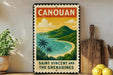 A vintage-style poster of the island of Canouan, featuring a tropical beach scene with palm trees and mountains in the background.