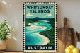 A vintage-style stamp depicting Whitsunday Islands, Australia, with a river and mountains in the background.