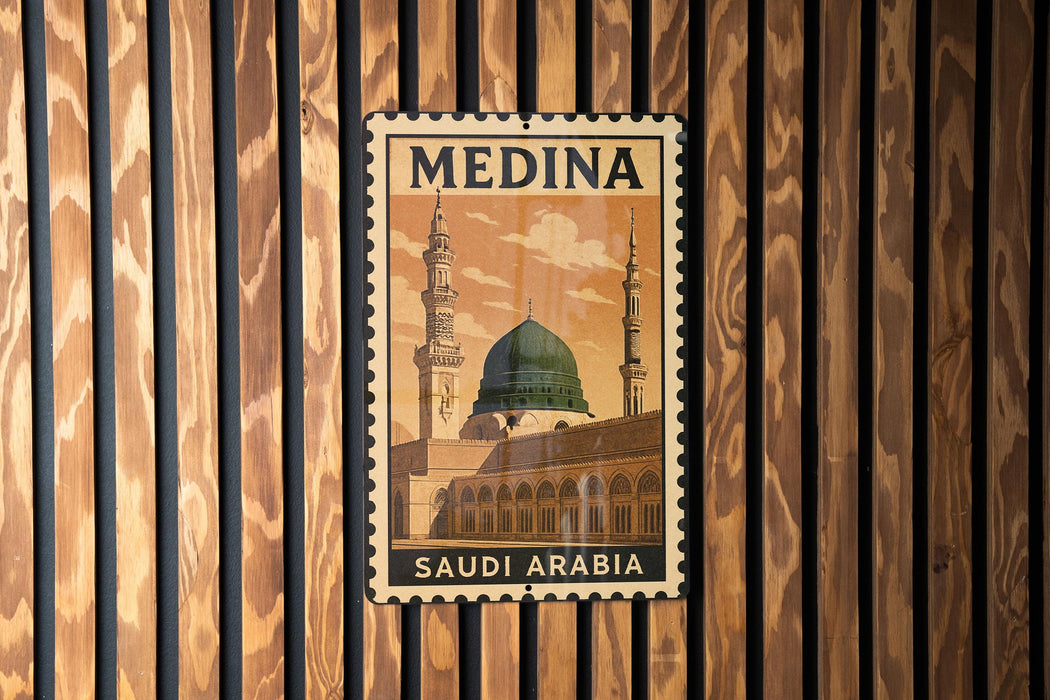 A vintage postage stamp featuring the Prophet's Mosque in Medina, Saudi Arabia, with the text "MEDINA SAUDI ARABIA" prominently displayed.