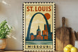 A vintage-style metal sign depicting St. Louis, Missouri, with a city skyline and the text "ST. LOUIS MISSOURI" prominently displayed.