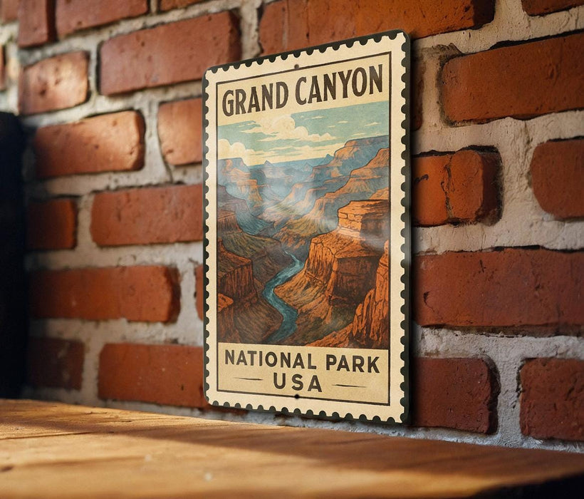 A vintage-style postage stamp depicting the Grand Canyon, with the text "GRAND CANYON NATIONAL PARK USA" printed on it.