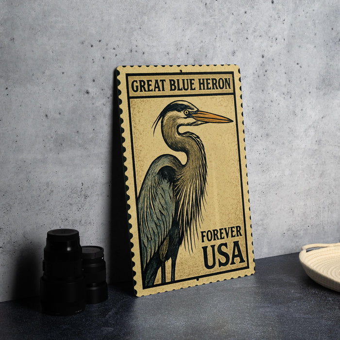 A postage stamp featuring a great blue heron, with the text "GREAT BLUE HERON FOREVER USA" printed on it.