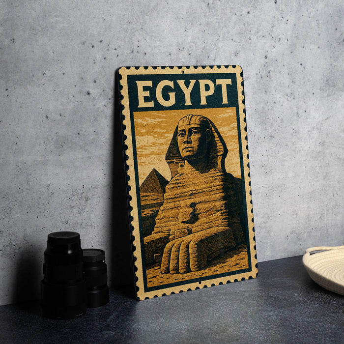 A framed image of the Sphinx, a famous ancient Egyptian monument, is displayed on a table.