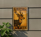 a deer stamp on a wall, with the word "CHITAL" and "DEER" printed on it.