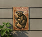 a wooden sign with a picture of a tarsier, a small primate, mounted on a wall.