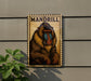 A framed illustration of a mandrill, a type of primate, is displayed on a wall.