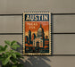 A vintage-style metal sign with the word "AUSTIN" and "TEXAS USA" printed on it, featuring an illustration of the Texas State Capitol building.