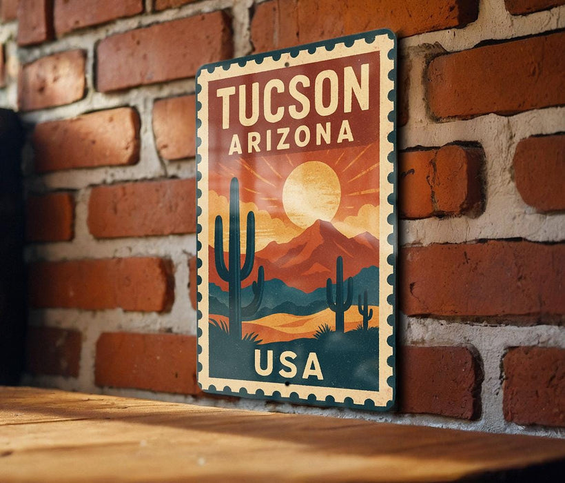 A vintage-style metal sign with the text "TUCSON ARIZONA USA" displayed on a brick wall.