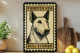 A bull terrier dog is featured on a metal sign with the text "Forever USA Bull Terrier" on a shelf.