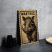 A wooden frame with a printed illustration of a warthog on it, placed on a table next to some black camera lenses.