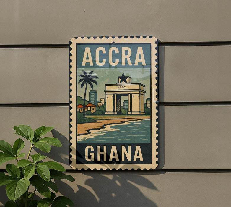 a sign that reads "ACCRA GHANA" with a graphic of a city and a palm tree.