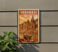 A vintage-style sign for Varanasi, India, featuring an illustration of a temple and a boat on a river.