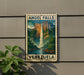 A vintage-style poster of Angel Falls, the world's highest uninterrupted waterfall, is displayed on a wall.