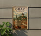 A vintage postage stamp depicting the town of Graz, Austria, with a church and other buildings in the background.