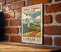 A vintage-style postage stamp depicting Prince Edward Island, Canada, with a lighthouse and a coastal landscape.