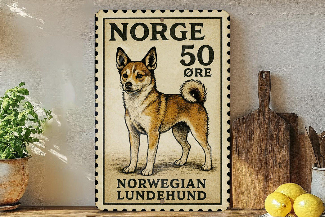 A vintage Norwegian Lundehund dog stamp is displayed on a wall, with a wooden cutting board and a potted plant to the side.