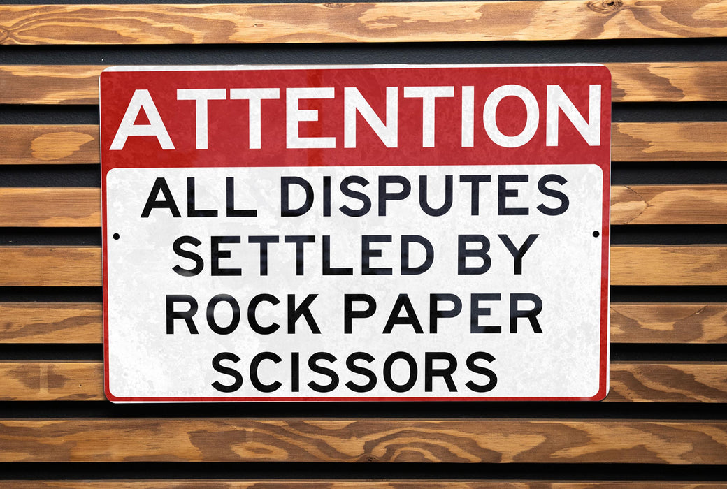 a red and white sign on a wooden wall