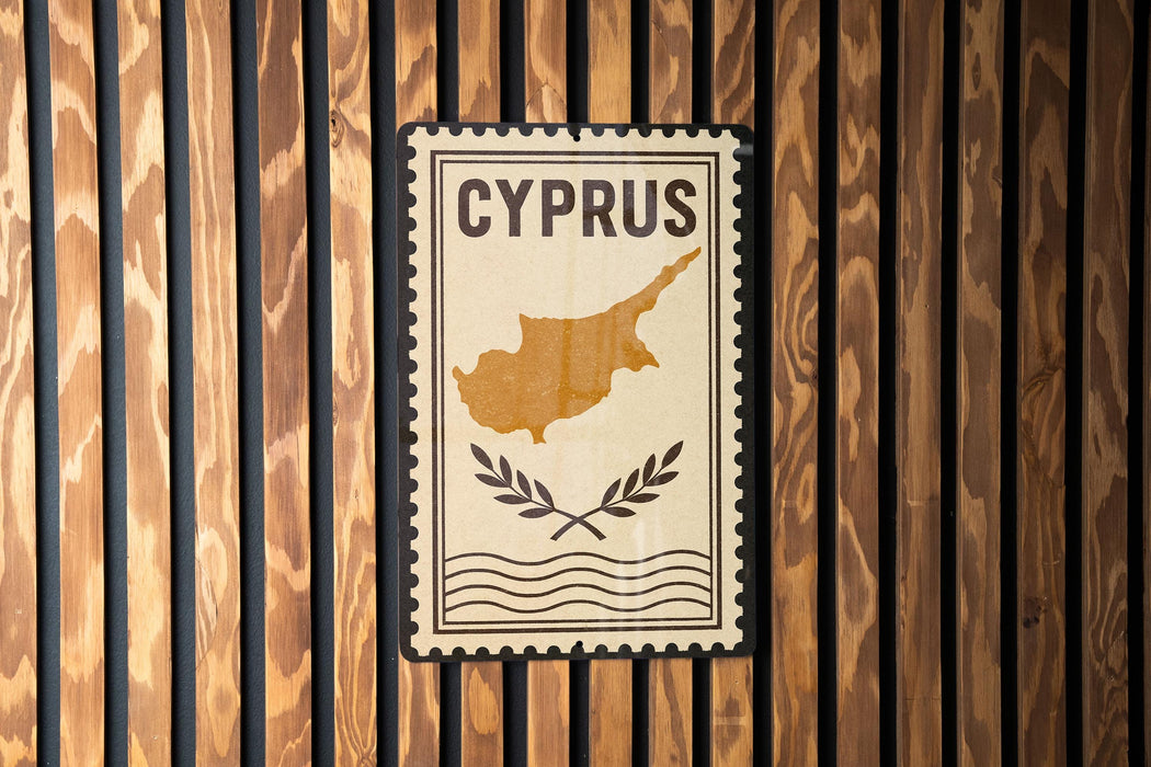 a sign with the word "CYPRUS" and a map of the island of Cyprus.