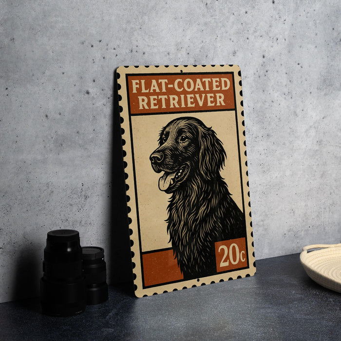 A flat-coated retriever dog illustration on a postage stamp-like sign, placed on a countertop next to some black camera lenses.