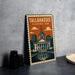 A metal sign with the text "Tallahassee, Florida, USA" and an illustration of the Tallahassee State Capitol building.