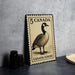 A metal stamp featuring a Canadian goose, with the text "5 CANADA" and "CANADA GOOSE" printed on it.