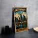 A metal sign with a cityscape of Frankfurt, Germany, featuring the city's iconic landmarks such as the Brandenburg Gate and the Spree River.