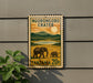 a postage stamp from Tanzania, depicting a scenic landscape with elephants and mountains in the background.