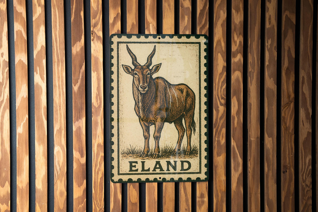 a metal sign with an illustration of a horned animal, likely a gazelle or similar species, mounted on a wooden wall.