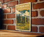A vintage-style stamp depicting Stonehenge, a famous monument in England, is displayed on a brick wall.