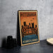 A vintage-style metal sign with the text "PITTSBURGH PENNSYLVANIA" and an illustration of a city skyline with a bridge.