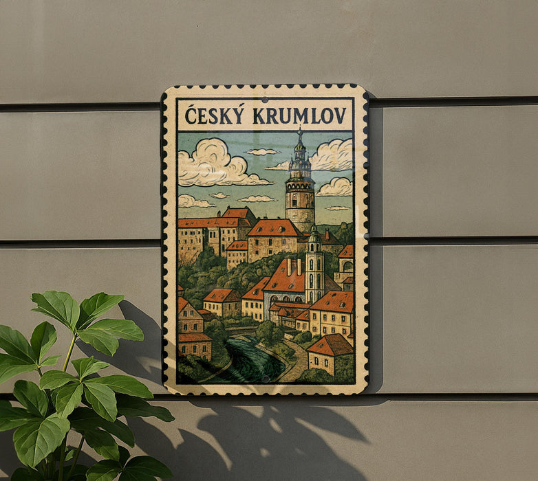 a vintage-style illustration of a town, with a castle and other buildings, mounted on a wall.