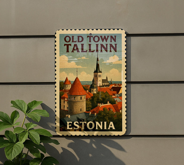 A vintage-style postage stamp depicting the town of Tallinn, Estonia, with a castle and other buildings in the background.