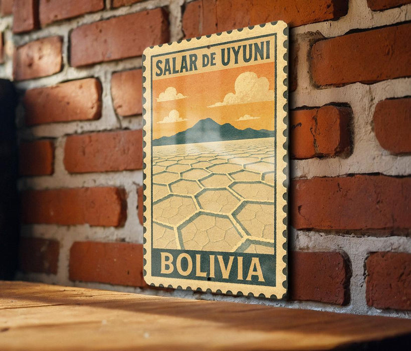 A vintage postage stamp from Bolivia featuring a desert landscape with mountains in the background.