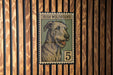 a stamp-like illustration of an Irish Wolfhound dog, with the text "IRISH WOLFHOUND" and the number "5" prominently displayed.