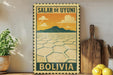 A vintage-style travel poster for Salar de Uyuni, Bolivia, featuring a desert landscape with mountains and a hexagonal pattern.