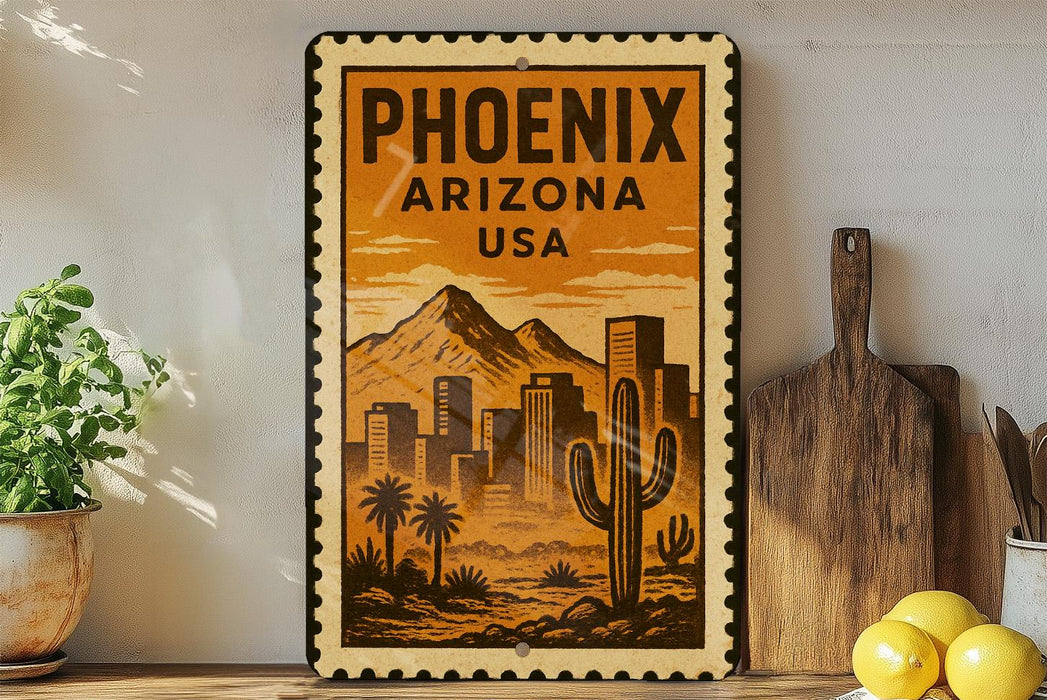 A vintage-style metal sign with a desert cityscape and mountains, featuring the text "PHOENIX ARIZONA USA" prominently displayed.