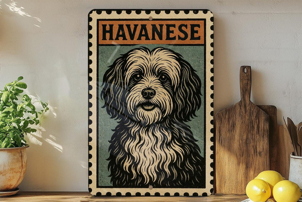 A framed illustration of a Havanaese dog is displayed on a shelf, accompanied by a wooden cutting board, a potted plant, and some lemons.