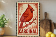 A red cardinal perched on a branch, with the word "CARDINAL" written below the image.
