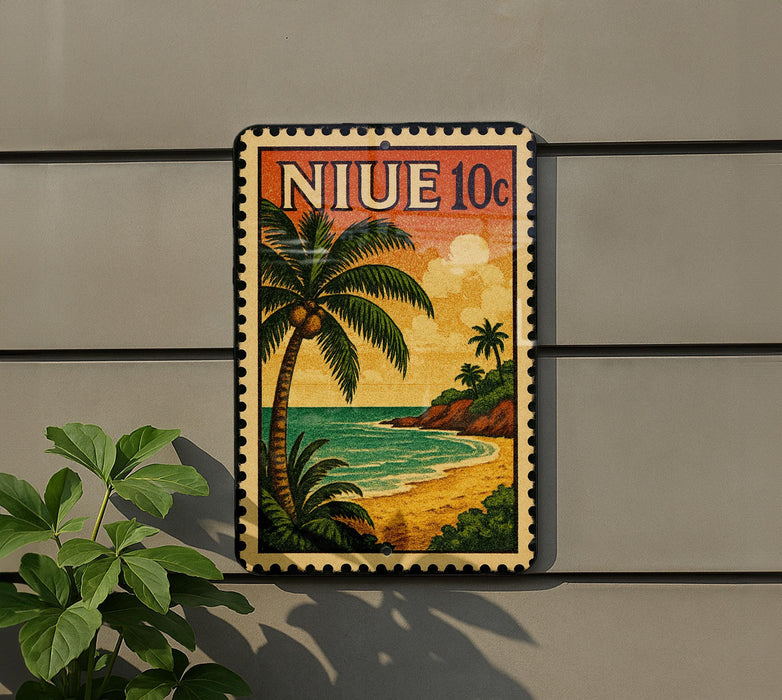 A vintage-style postage stamp depicting a tropical beach scene with palm trees, a sunset, and a body of water.