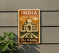 A vintage-style sign depicting the Taj Mahal, a famous mausoleum in India, mounted on a wall.