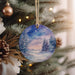 a christmas ornament hanging from a christmas tree