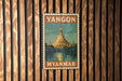 A vintage-style metal stamp depicting the Shwedagon Pagoda, a famous Buddhist temple in Yangon, Myanmar.