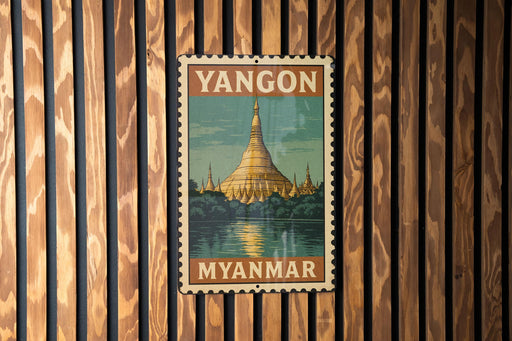 A vintage-style metal stamp depicting the Shwedagon Pagoda, a famous Buddhist temple in Yangon, Myanmar.