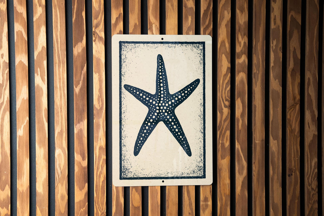 a starfish on a wooden wall.