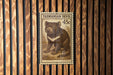 A postage stamp featuring a Tasmanian Devil, a small marsupial native to Australia.
