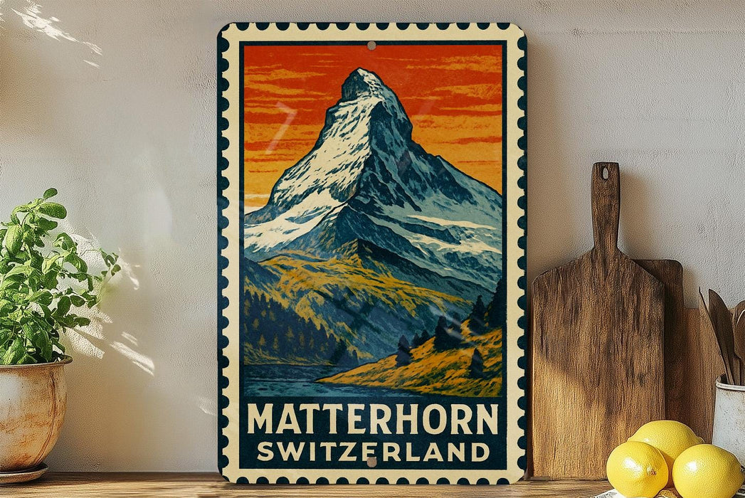 A vintage-style metal sign depicting the Matterhorn mountain peak in Switzerland, with a wooden cutting board and lemons in the foreground.