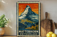 A vintage-style metal sign depicting the Matterhorn mountain peak in Switzerland, with a wooden cutting board and lemons in the foreground.